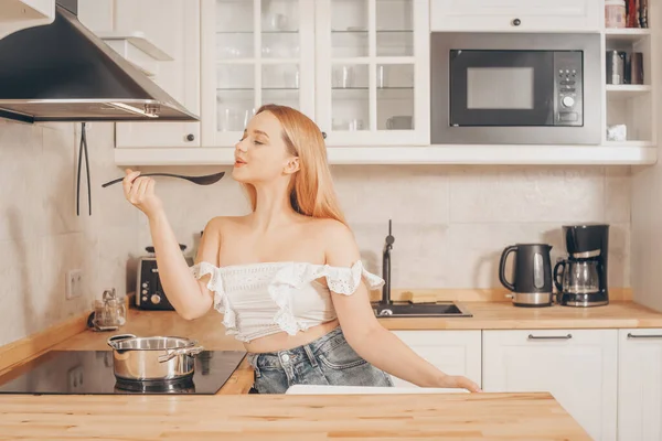 Beautiful Girl Prepares Food Induction Stove Woman Cooks Soup Sauce — Stock Photo, Image