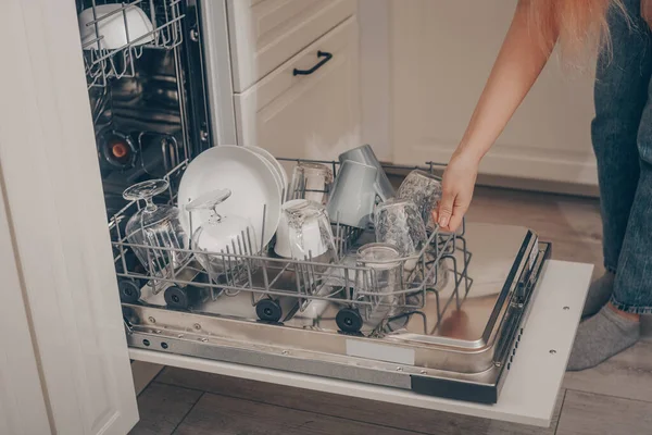 Built Dishwasher Dishwashing Woman Loads Washed Dishes Cups Glasses Woman — Stock Photo, Image