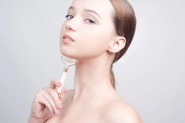 Beauty Face Care Woman Doing Face Massage White Jade Facial — Stock Photo, Image