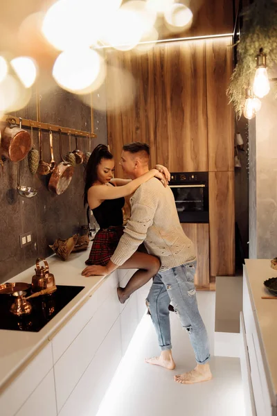 young couple in love  on kitchen