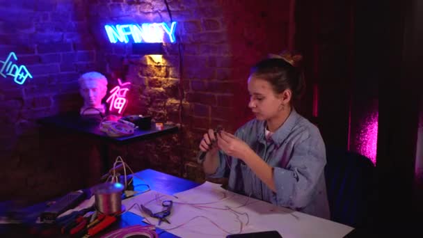 Young Beautiful Girl Makes Neon Signs Workshop Talented Artist Work — Stock Video