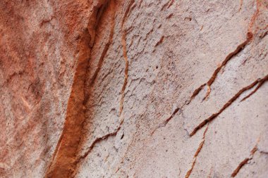 Turuncu kum taşı dokusu. Tuz pembe mağara arka planı.