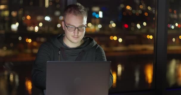 Young Man Uses Laptop Night — Stock Video