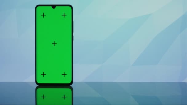 携帯電話でのアニメーション 緑の画面の携帯電話 広島の鍵となるスマートフォン技術 — ストック動画