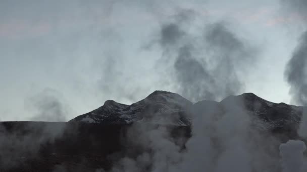 Boiling geysers with steam rising to the sky in Iceland. — Stock Video