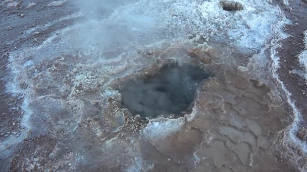Boiling geysers with steam rising to the sky in Iceland. — Stock Video