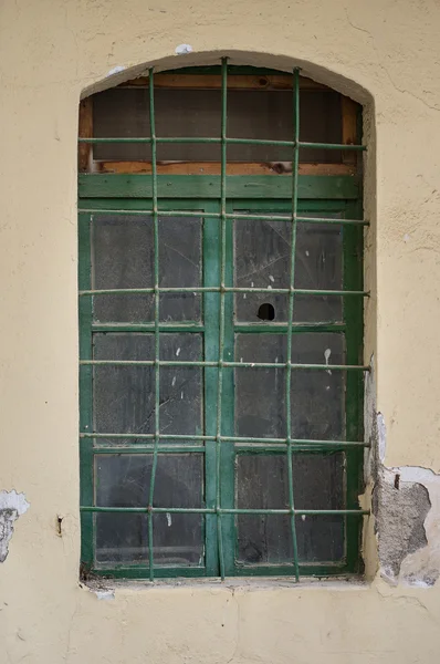 Blue narrow timber door on the white background — Stock Photo, Image