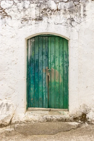 Blue narrow timber door on the white background — Stock Photo, Image