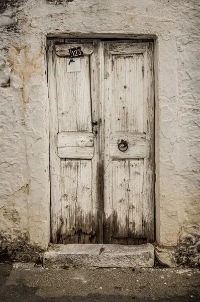 Blue narrow timber door on the white background — Stock Photo, Image