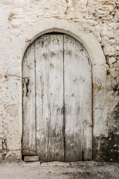 Blue narrow timber door on the white background — Stock Photo, Image