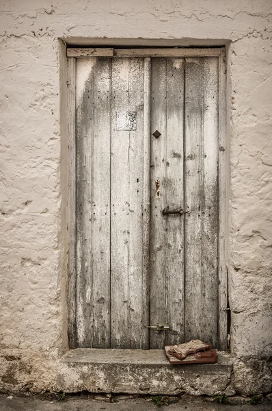 Blue narrow timber door on the white background — Stock Photo, Image