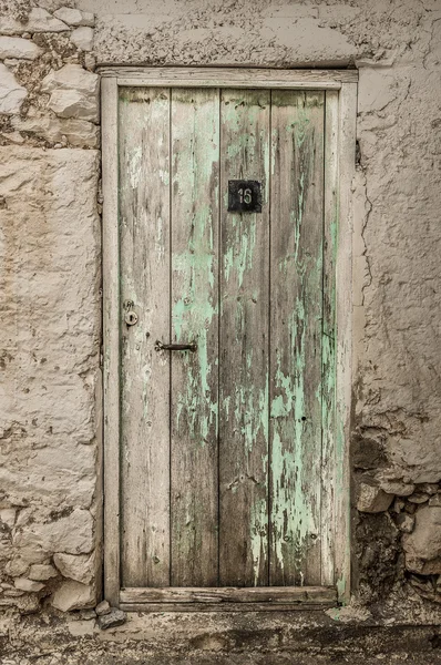 Blue narrow timber door on the white background — Stock Photo, Image