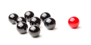 Concept with red and black marbles -  Mobbing clipart