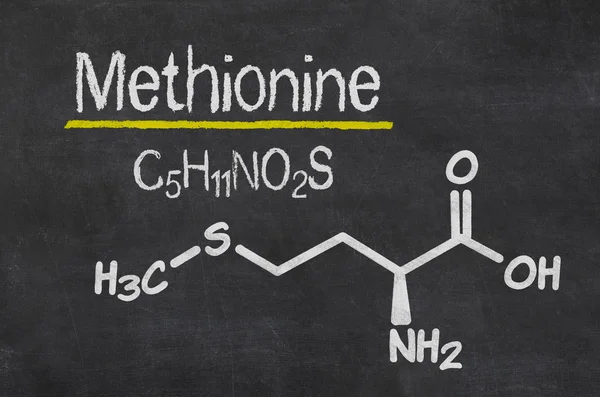 Доска с химической формулой метионина — стоковое фото
