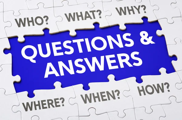 Text on puzzle pieces - Questions and answers — Stock Photo, Image