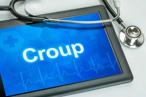 Tablet con la diagnosi Croup sul display — Foto Stock