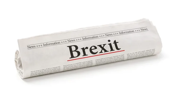 Giornale arrotolato con il titolo Brexit — Foto Stock