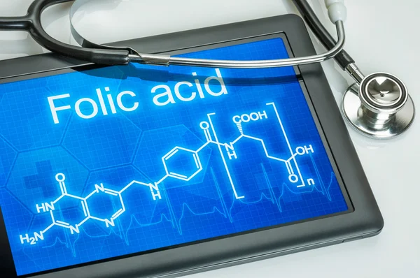 Tablet with the chemical formula of Folic Acid — Stock Photo, Image