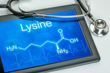 Tablet with the chemical formula of Lysine clipart