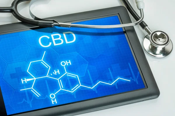 Tablette mit der chemischen Formel von cbd Stockbild