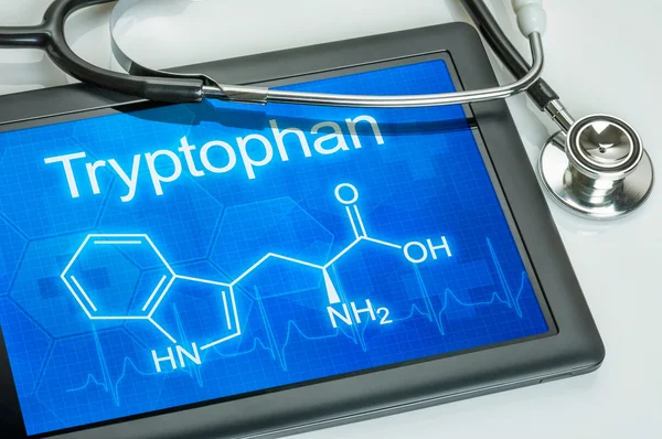 Tablet met de chemische formule van tryptofaan — Stockfoto