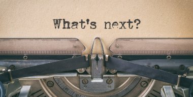 Text written with a vintage typewriter -  Whats new clipart