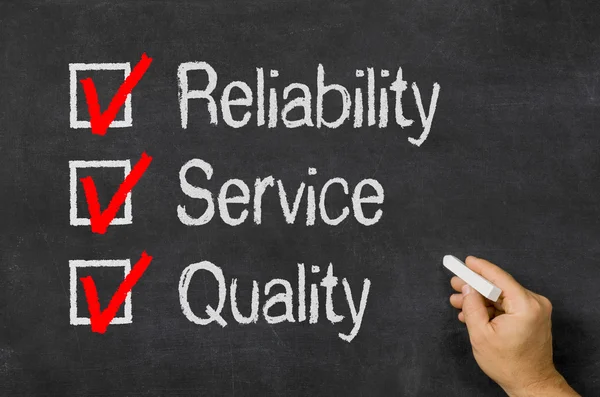 Blackboard with a checklist Reliability, Service and Quality — Stock Photo, Image