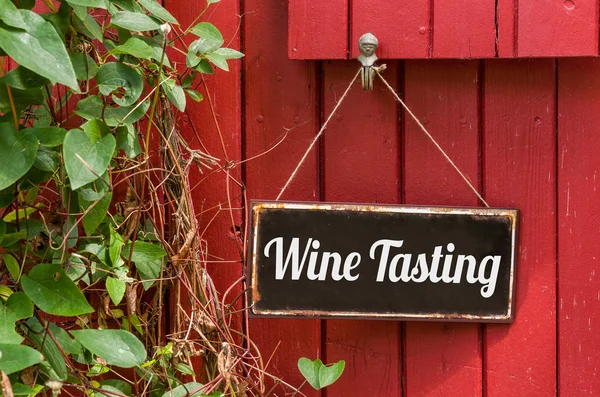Old metal sign with the inscription Wine Tasting — Stock Photo, Image