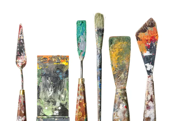 Various palette knives and a brush on a white background — Stock Photo, Image