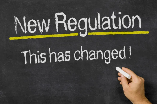 Tafel mit dem Text der neuen Verordnung — Stockfoto