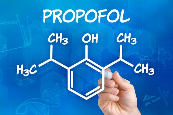 Mano con penna disegnare la formula chimica di Propofol — Foto Stock