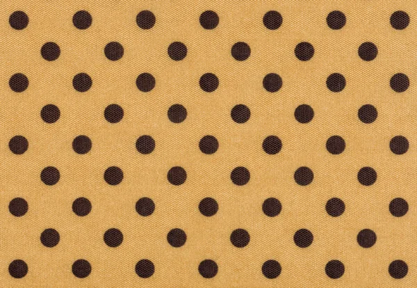 Beige fabric with dark polka dots — Stock Photo, Image