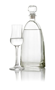 A glass of grappa with a bottle clipart