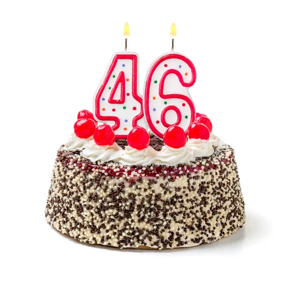 Birthday cake with a burning candle — Stock Photo, Image