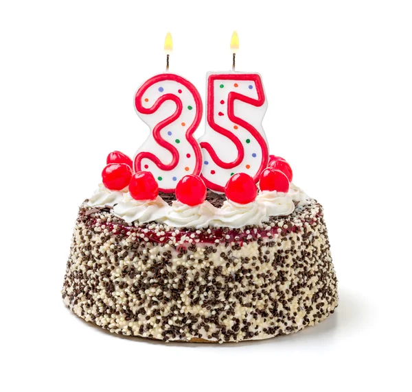Yanan bir mum ile doğum günü pastası — Stok fotoğraf