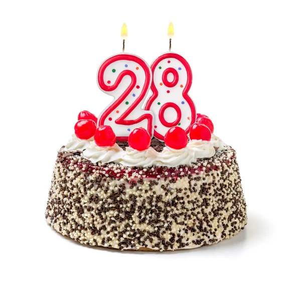 Yanan bir mum ile doğum günü pastası — Stok fotoğraf