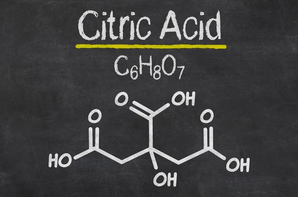 Tableau noir avec une formule chimique — Photo