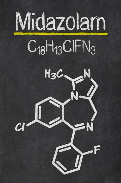 Tableau noir avec une formule chimique — Photo