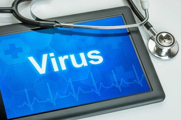 Tablett med texten Virus på displayen — Stockfoto