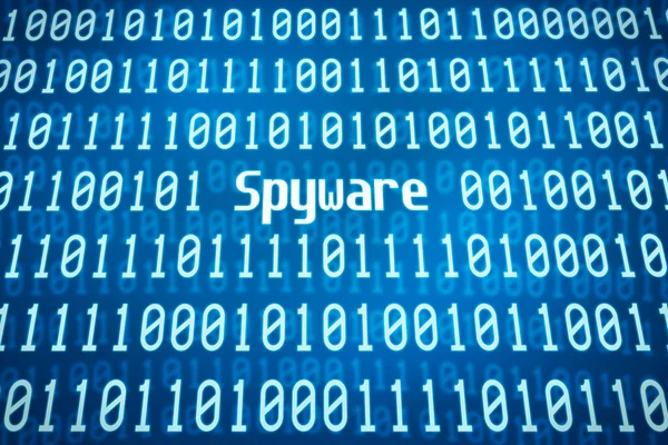 Binaire code met het woord Spyware in het midden — Stockfoto