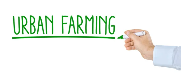 Mano con penna scrittura Urban Farming — Foto Stock