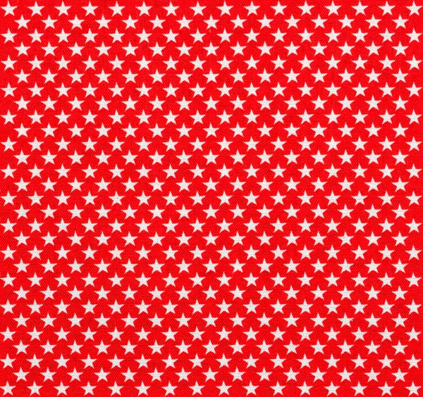 Червона тканина з білими зірками — стокове фото