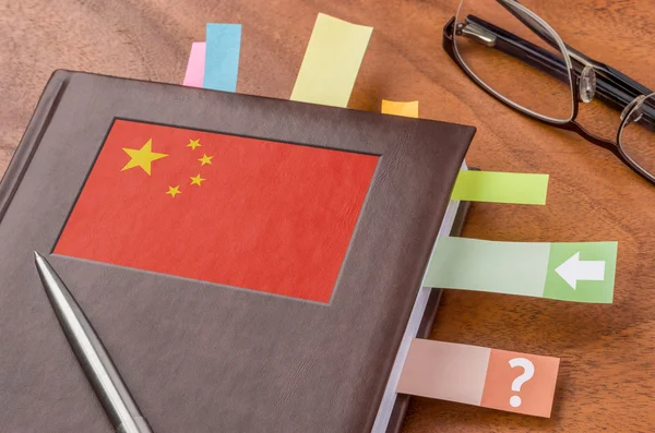 Notebook with the flag of China — Stock Photo, Image