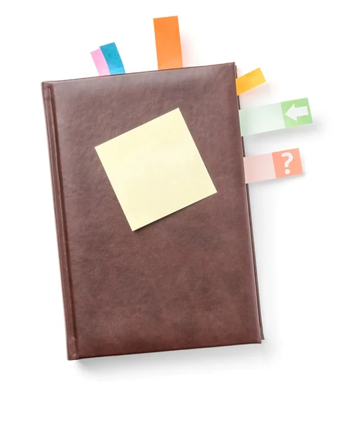 Planner met sticky note op een witte achtergrond — Stockfoto