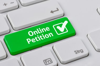 A keyboard with a green button - Online Petition clipart