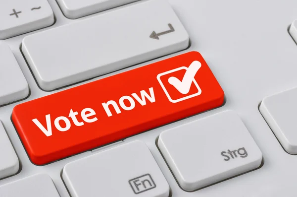 A keyboard with a red button - Vote now — Stock Photo, Image