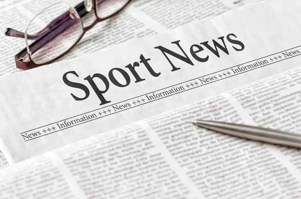 A newspaper with the headline Sport News — Stock Photo, Image