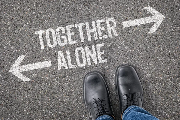 Decision at a crossroad - Together or Alone — Stock Photo, Image