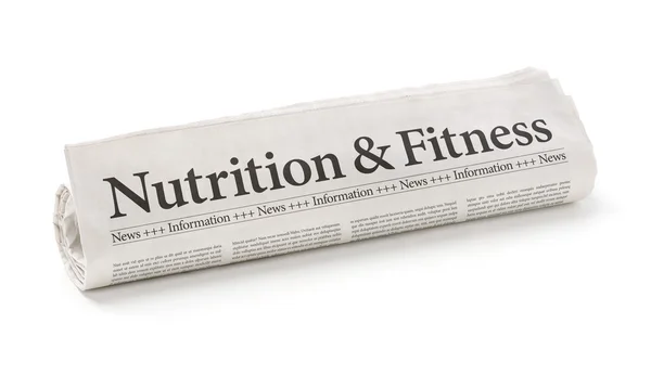 Válcované noviny s titulkem výživa a Fitness — Stock fotografie