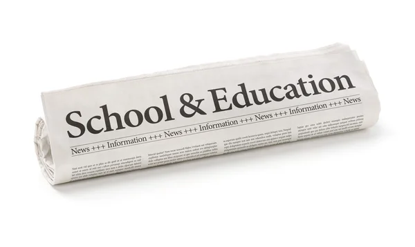 Rolled newspaper with the headline School and Education — Stock Photo, Image